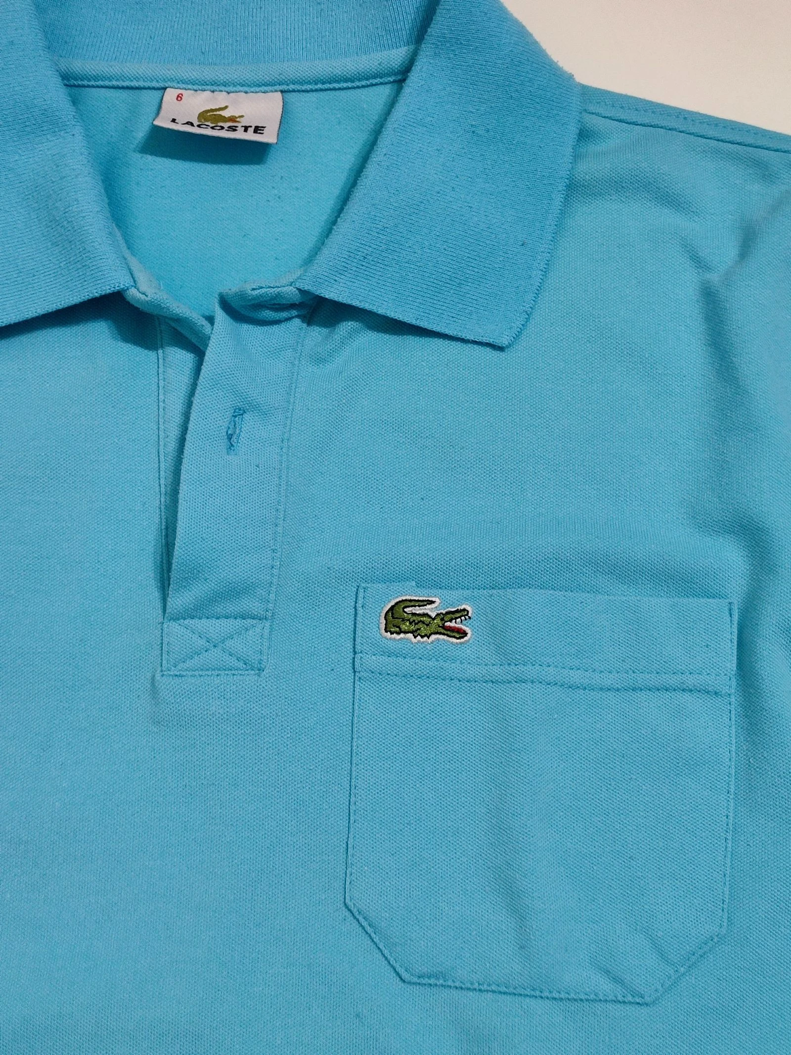 Vintage Lacoste polohemd lichtblauw met zak Maat 6 (XL) – photo 3